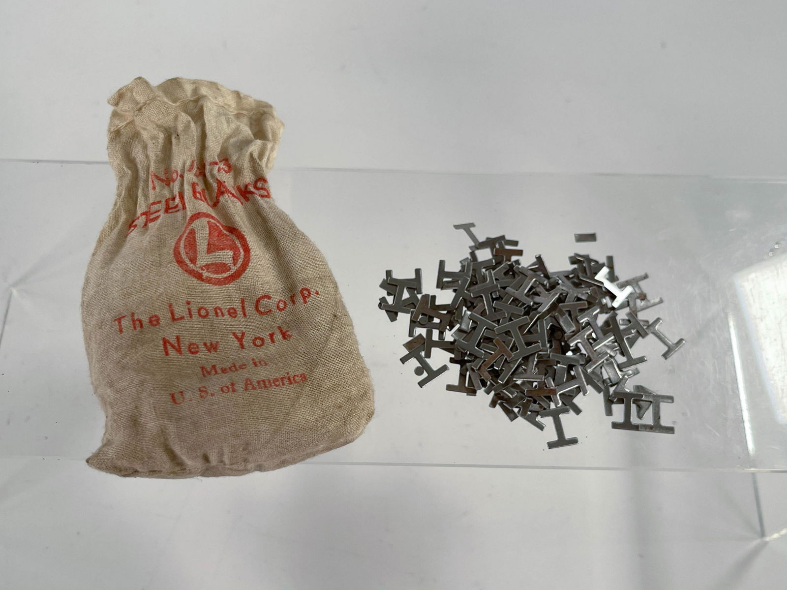 Lionel Postwar #182-22 Bag of Metal Scrap (1 of 5)