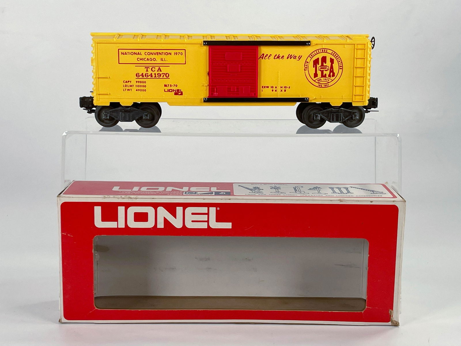 Lionel Postwar #6464-1970 TCA Yellow Boxcar, with: Lionel Postwar #6464-1970 TCA Yellow Boxcar, with Original Box, in C8 minus.