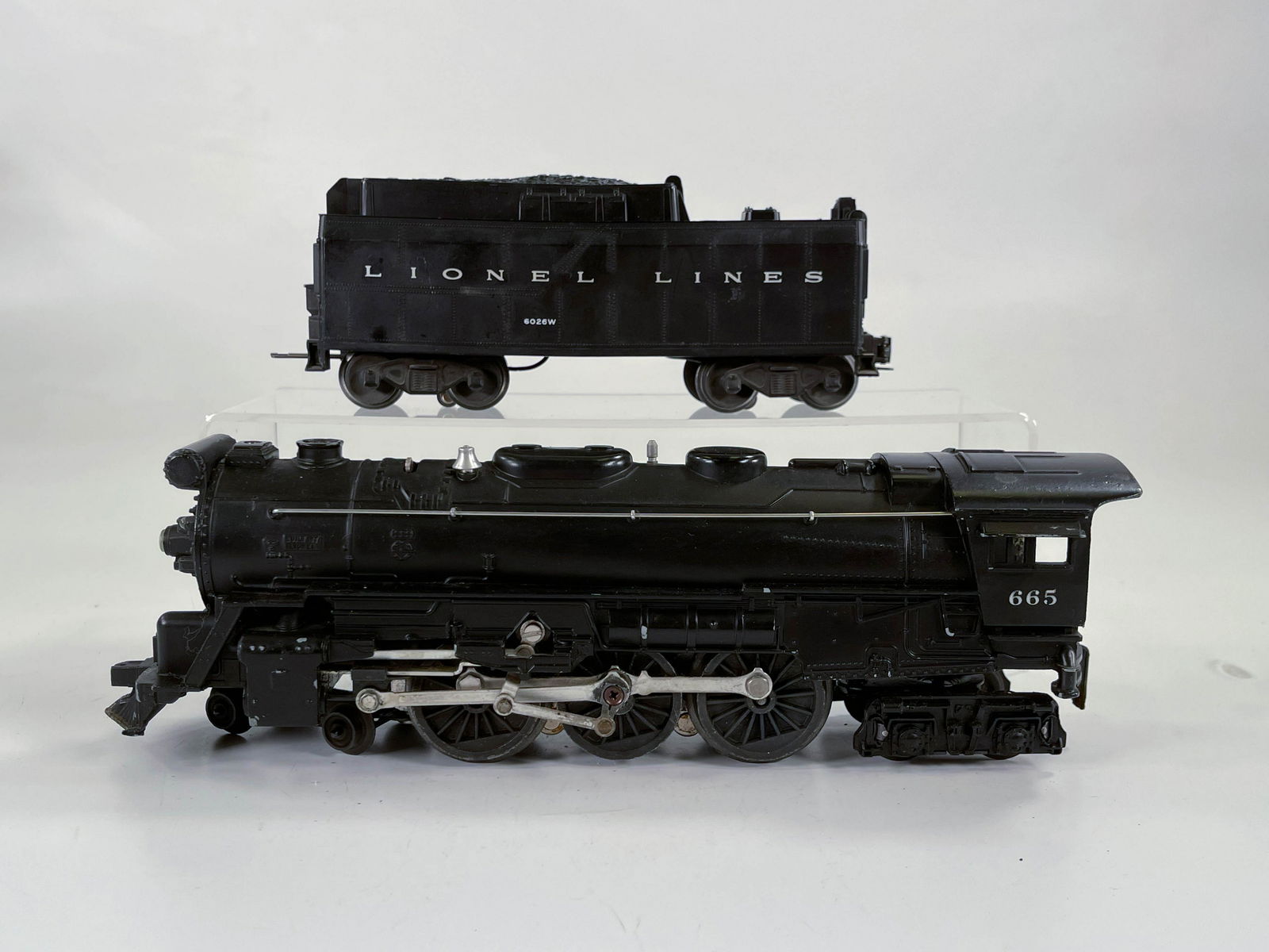 Lionel Postwar #665 Black Loco and #6026W Black Tender,: Lionel Postwar #665 Black Loco and #6026W Black Tender, with Loco and Tender in overall C7.