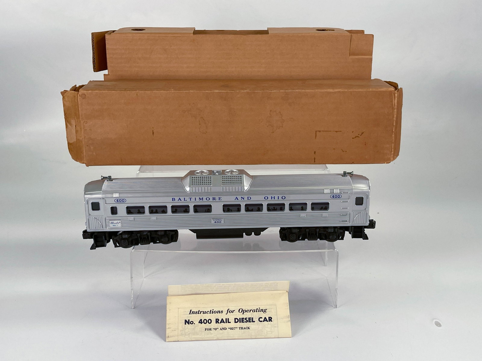 Lionel Postwar #400 Rail Diesel Car, with Original: Lionel Postwar #400 Rail Diesel Car, with Original Box/Liner/Instructions, with #400 Diesel Rail Car in C7 plus and box has some minor wear at one end with original liner and instructions.
