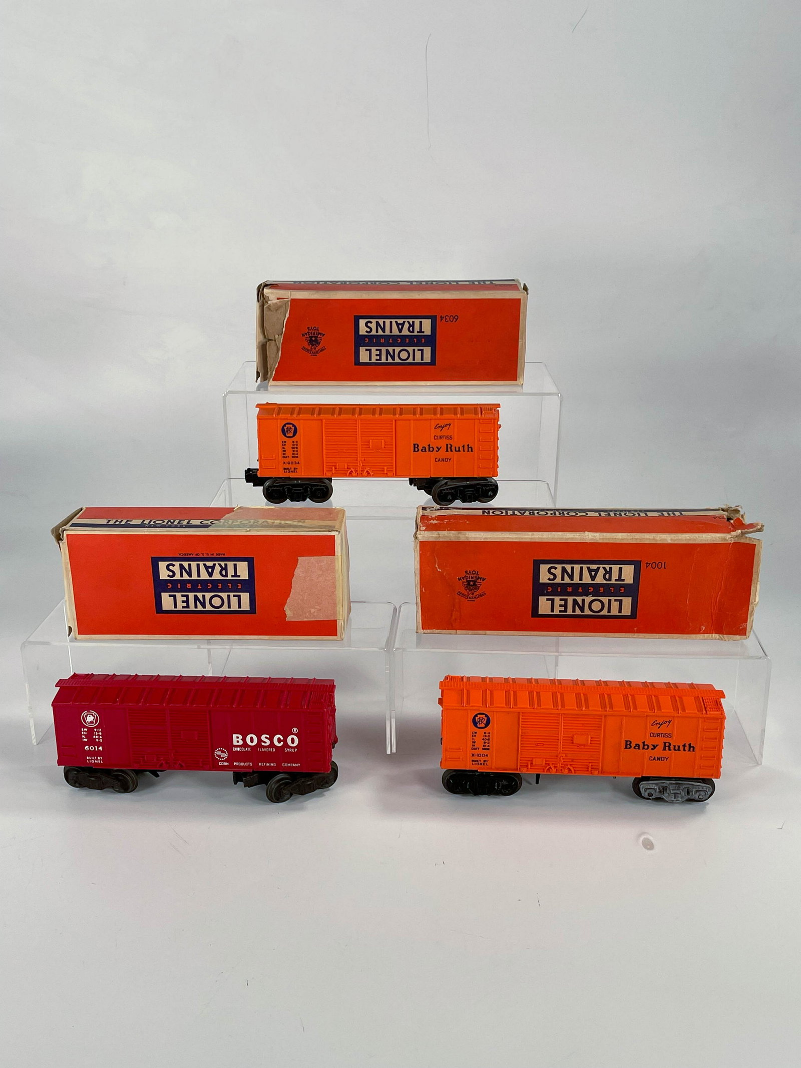 Lionel Postwar #6014 Box Car with Original Box, #6034: Lionel Postwar #6014 Box Car with Original Box, #6034 Box Car with Original Box and #1004 Box Car with Original Box, with #6034 in C7 plus with original box having one end with severe torn damage, #60