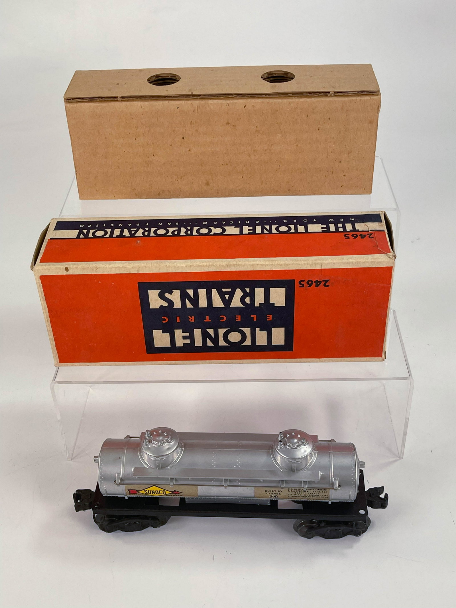 Lionel Postwar #2465 Tank Car, with Liner/Box, in C7: Lionel Postwar #2465 Tank Car, with Liner/Box, in C7 plus with Liner and Box.