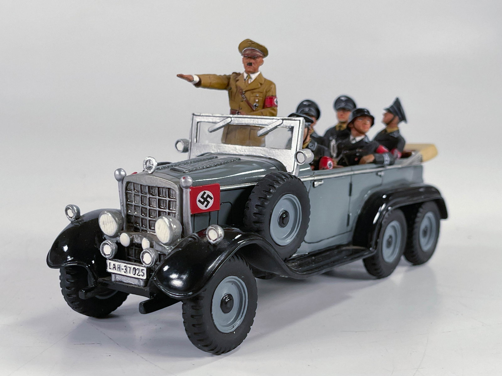 Toy Nazi Mercedes Benz replica open air car with four: Toy Nazi Mercedes Benz replica open air car with four Nazi soldiers and Hitler, in C7 plus overall.