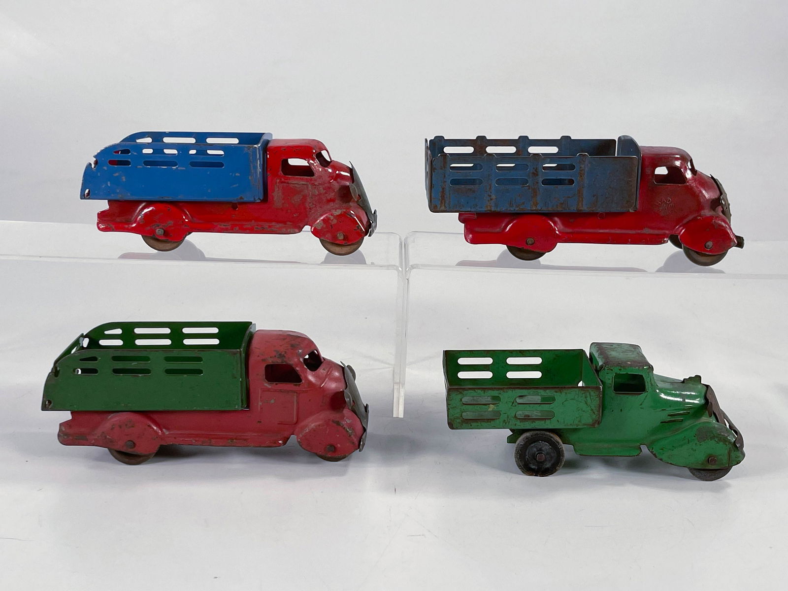Marx and Wyandotte toys consisting of four dump trucks (1 of 6)