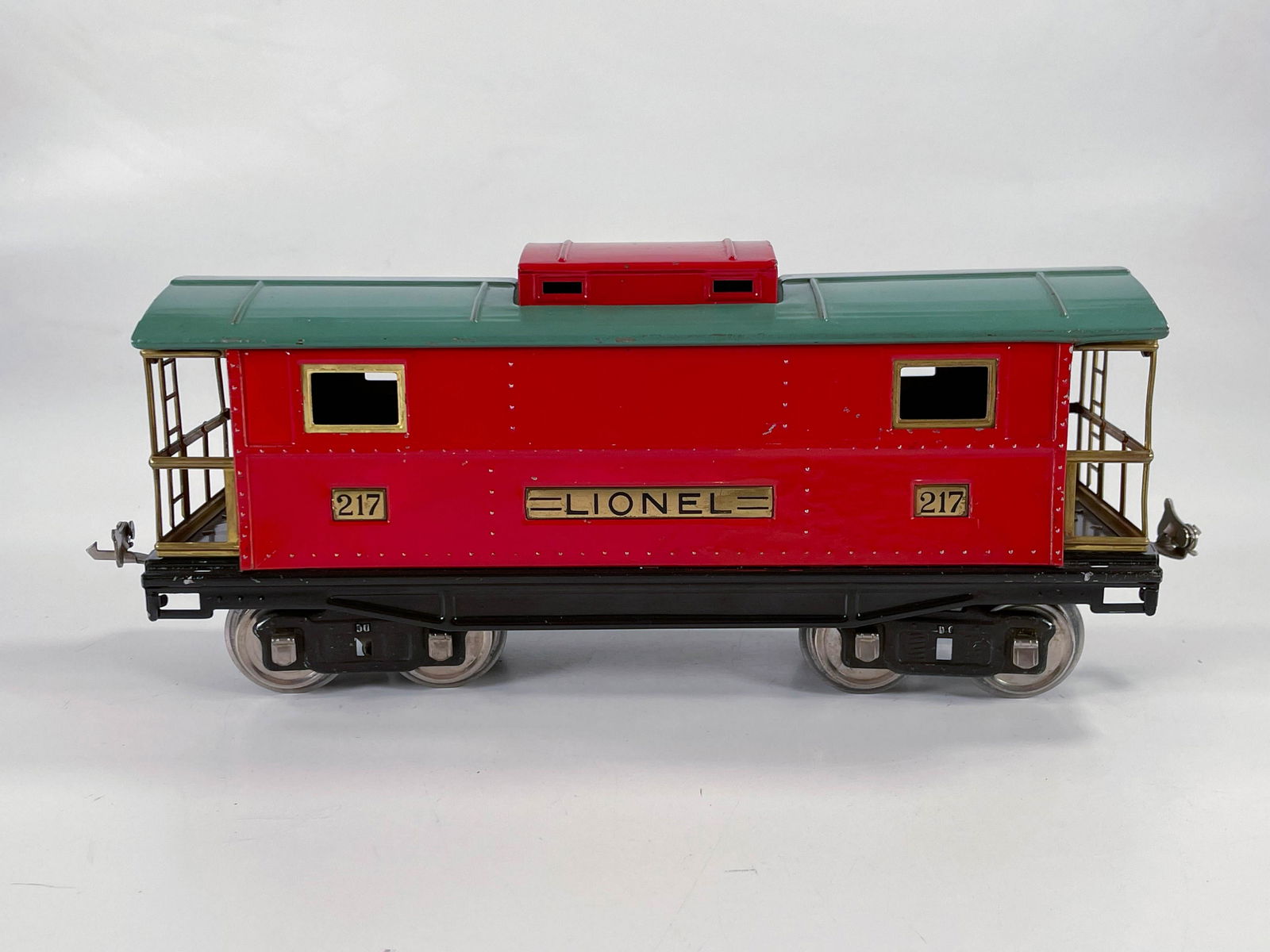 Lionel Prewar #217 caboose in red/peacock roof (1 of 6)