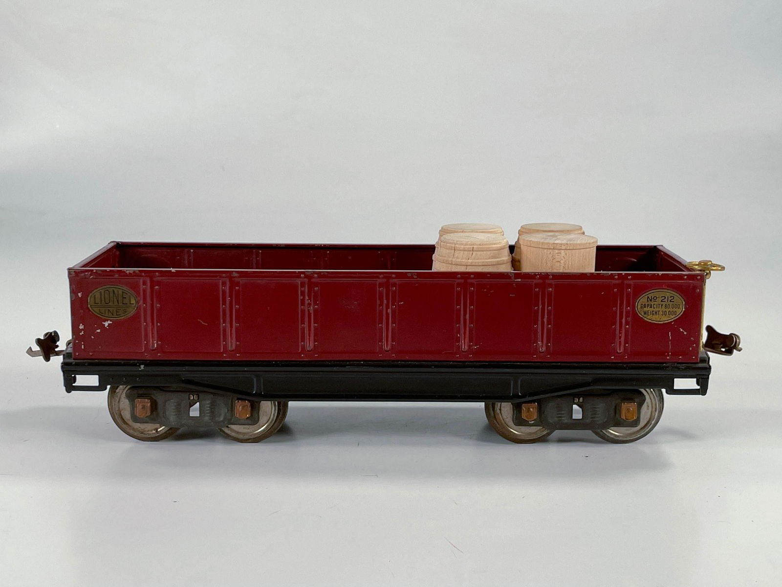 Lionel Prewar #212 Gondola in maroon with four barrels (1 of 6)