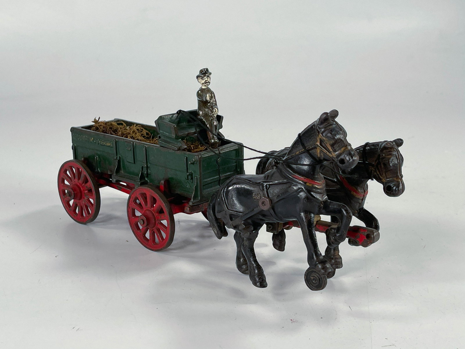 Arcade prewar toy McCormick Deering contactors dray: TArcade prewar toy McCormick Deering contactors dray with horses, in surprisingly in very good C6 overall condition although there may be some red touch up to the back of wagon frame.