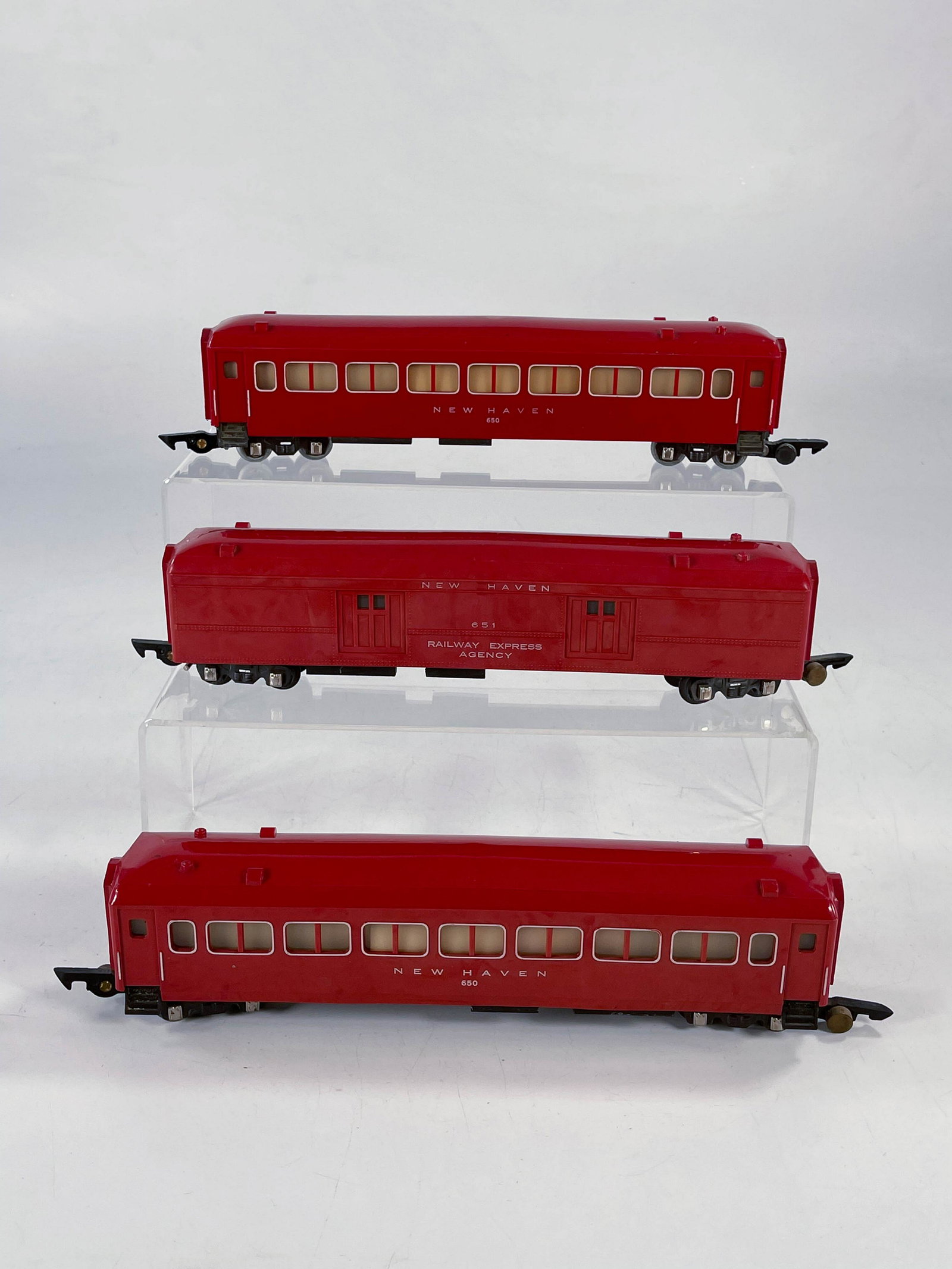 American Flyer S Gauge by Gilbert Red New Haven: American Flyer S Gauge by Gilbert Red New Haven Passenger Cars #650, #650 and #651, with #650 in C7, with #650 in C6 with one side faded and #651 in C6.