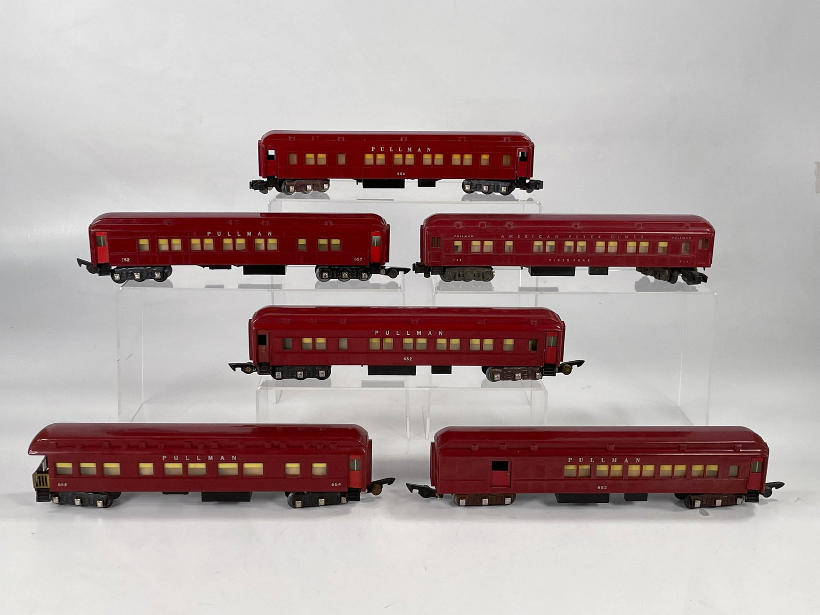 American Flyer S Gauge by Gilbert Unpainted Red: American Flyer S Gauge by Gilbert Unpainted Red Heavyweight Passenger Cars, including #652, #652, #652, #653, #654 and #962, with all passenger cars in C7 except for #962 which is in C6.