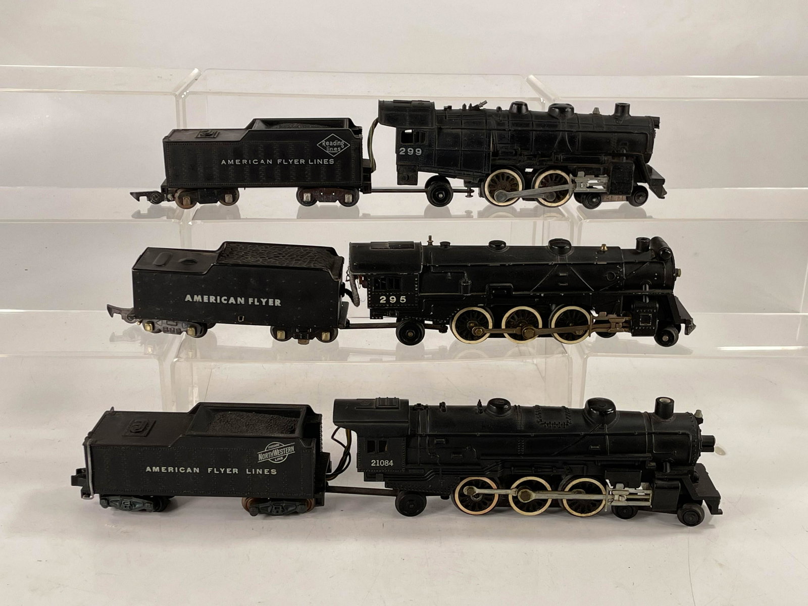 American Flyer S gauge by Gilbert #21084 Locomotive and: American Flyer S gauge by Gilbert #21084 Locomotive and Tender, #295 Locomotive and Tender #299 Locomotive and Tender, all in C6 to C7.
