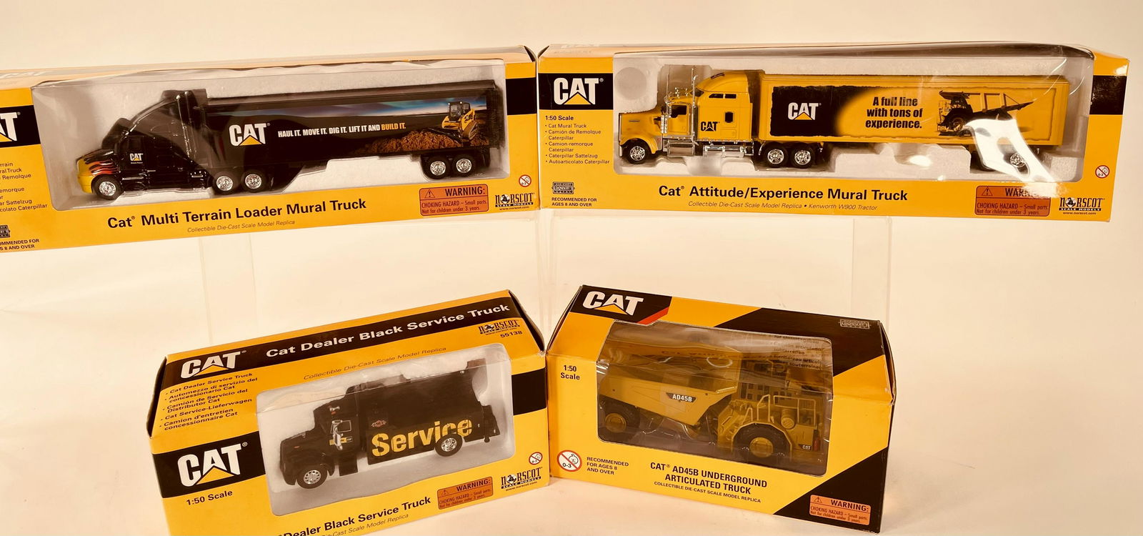 Norscot Scale Model Cat Four (4) Assorted Trucks and (1 of 2)