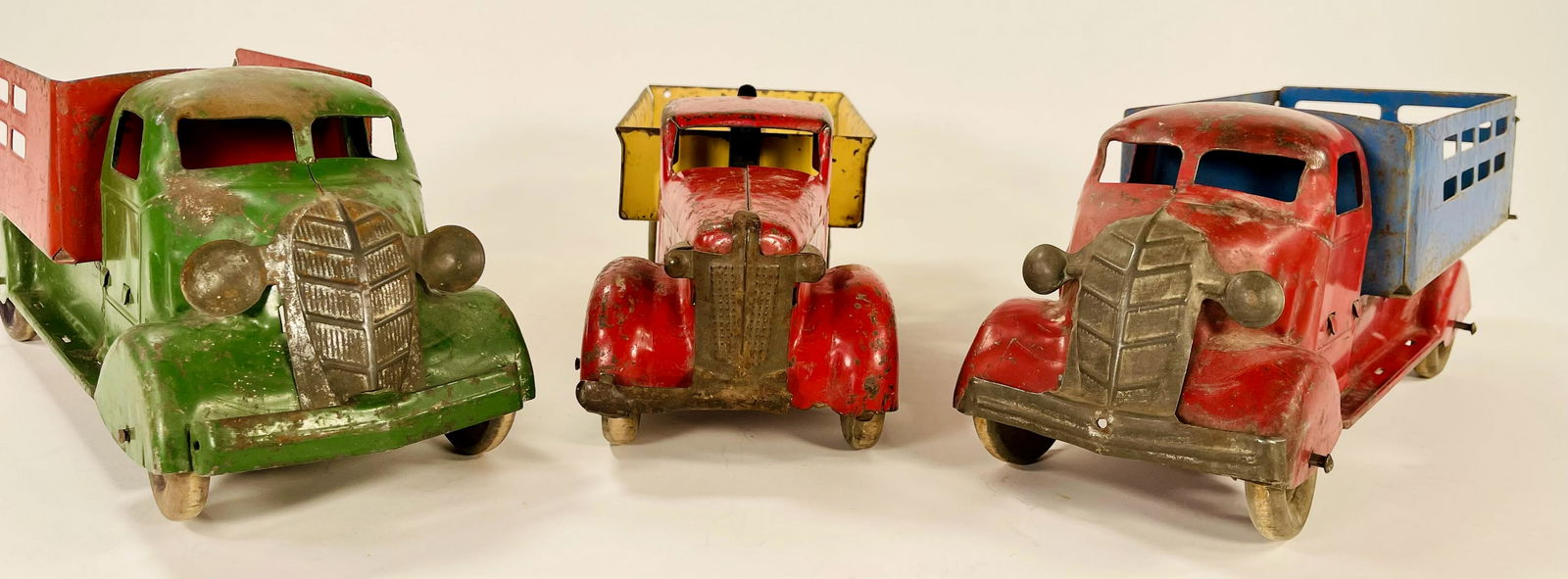 Marx Two Dump and Stack Trucks and Wyandotte Red/Yellow (1 of 3)