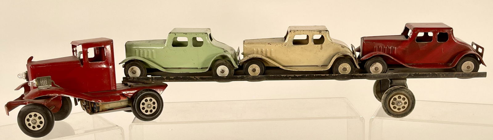 Wyandotte truck with car trailer and load of three (3) (1 of 3)