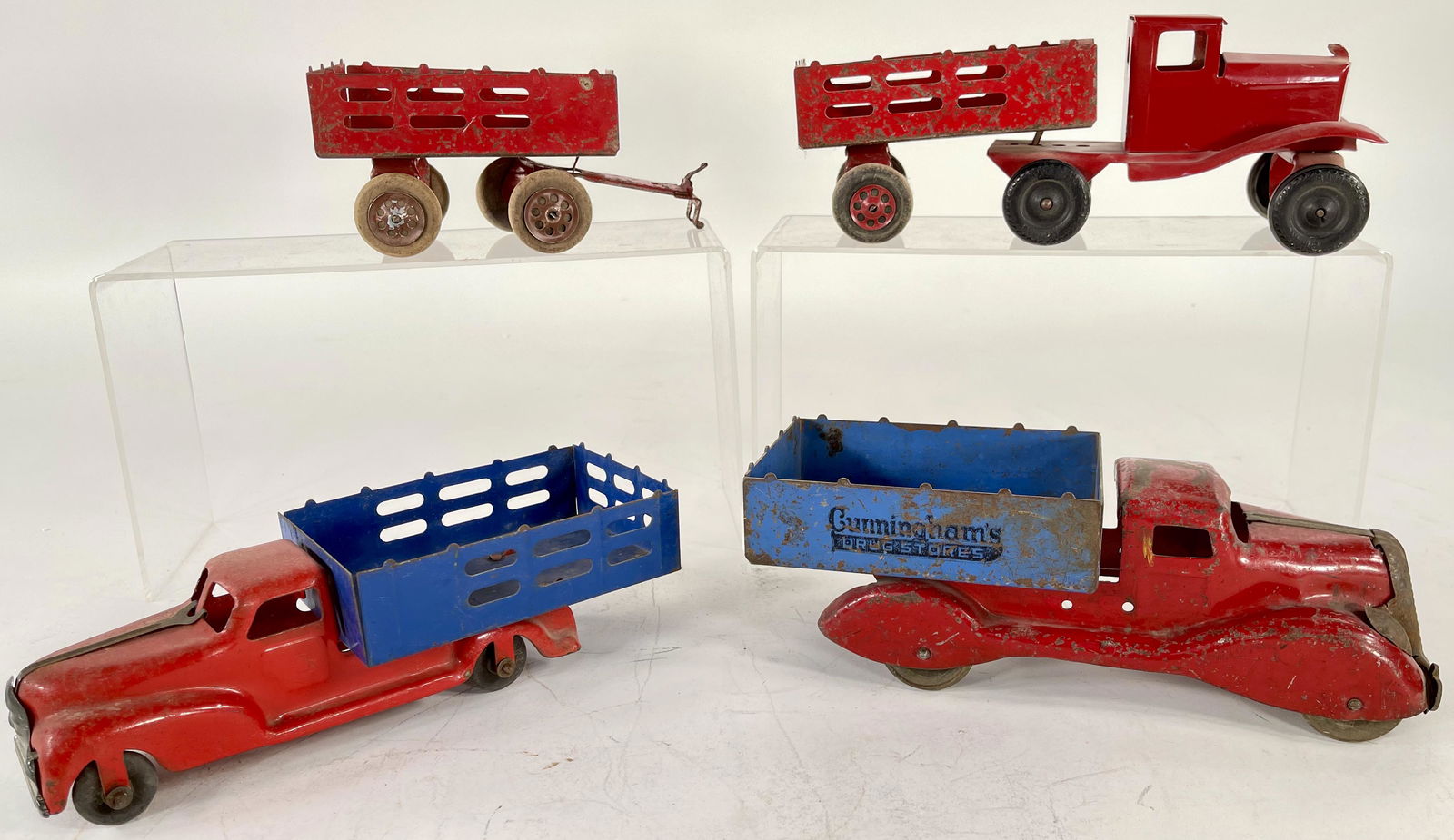 Two Marx trucks and Wyandotte red truck with trailer (1 of 3)
