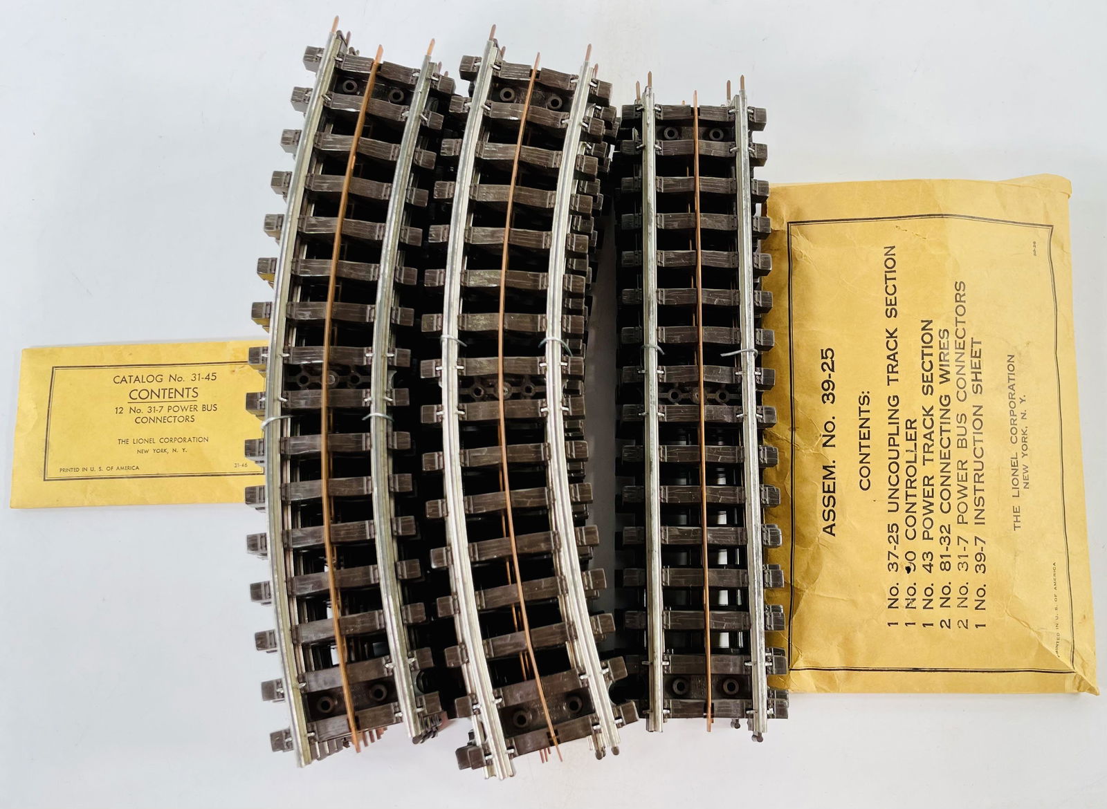 Postwar Lionel O Gauge 39 – 25 Super O Assembly Packet and 3145 Packet of Power Bus (1 of 8)