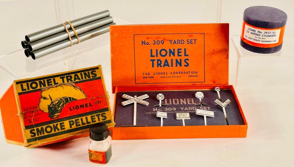 Lionel Postwar 3927 – 50 25 wiping cylinders, box of smoke pellet jars, tube of pipes and 309 (1 of 6)