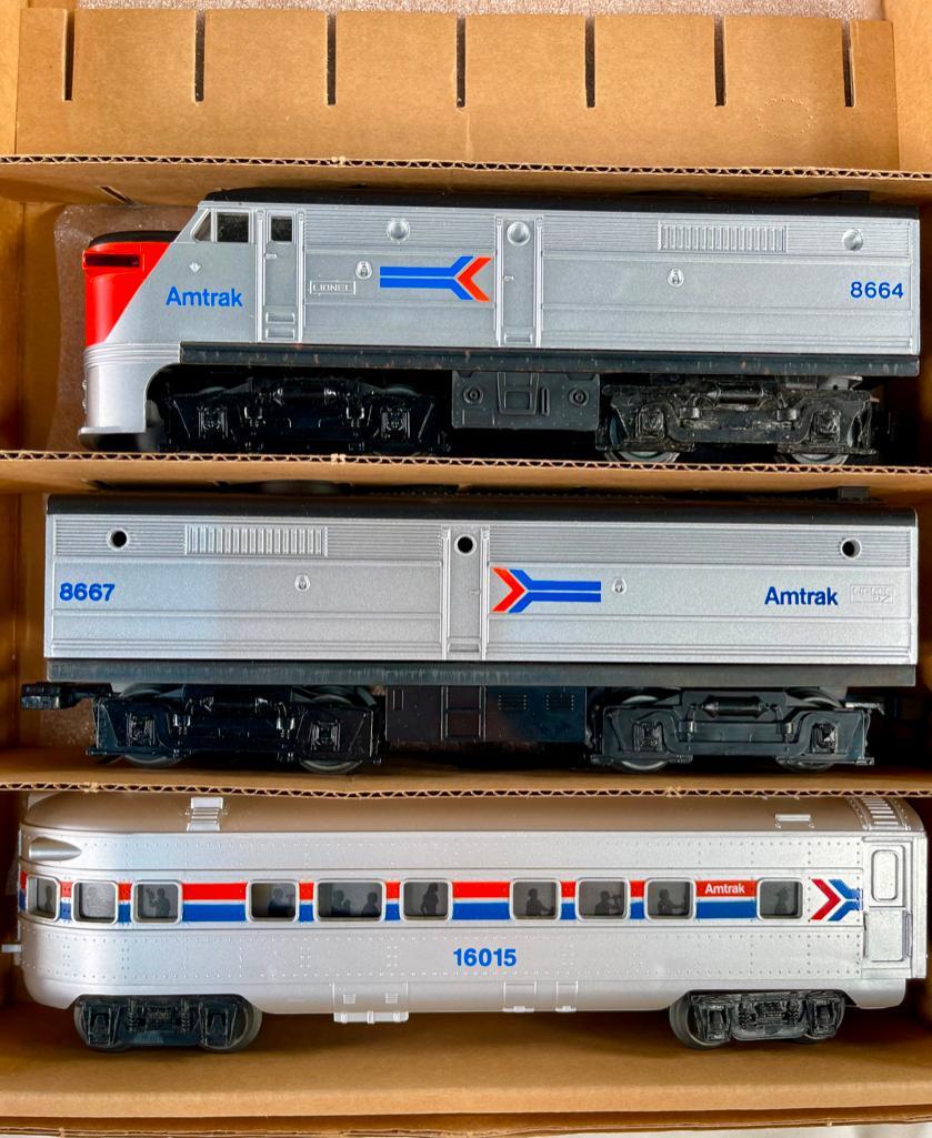 MPC Lionel Amtrak 8664/8667 AB Alco Units and Passenger Car: MPC Lionel Amtrak 8664/8667 AB Alco Units and Passenger Car, including Amtrak 8664/8667 AB Alco Units in overall C8 and includes an Amtrak 16015 passenger car in C8.