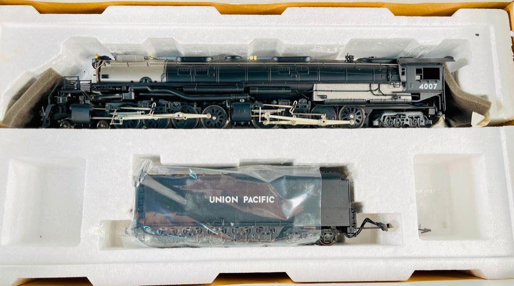 3rd Rail Union Pacific Big Boy 4 â€“ 8 â€“ 8 â€“ 4 Steam Locomotive and Tender 3-Rail: 3rd Rail Union Pacific Big Boy 4 â€“ 8 â€“ 8 â€“ 4 Steam Locomotive and Tender 3-Rail (Factory painted brass O scale), in in C8 and original box that has some slight wear.