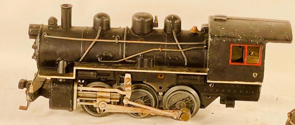 American Flyer Prewar O Gauge #3020 Electric, Locomotive and #1218 Black Electric: American Flyer Prewar O Gauge #3020 Electric, Locomotive and #1218 Black Electric, all in C4 to C5 overall. There are no returns on this Lot.