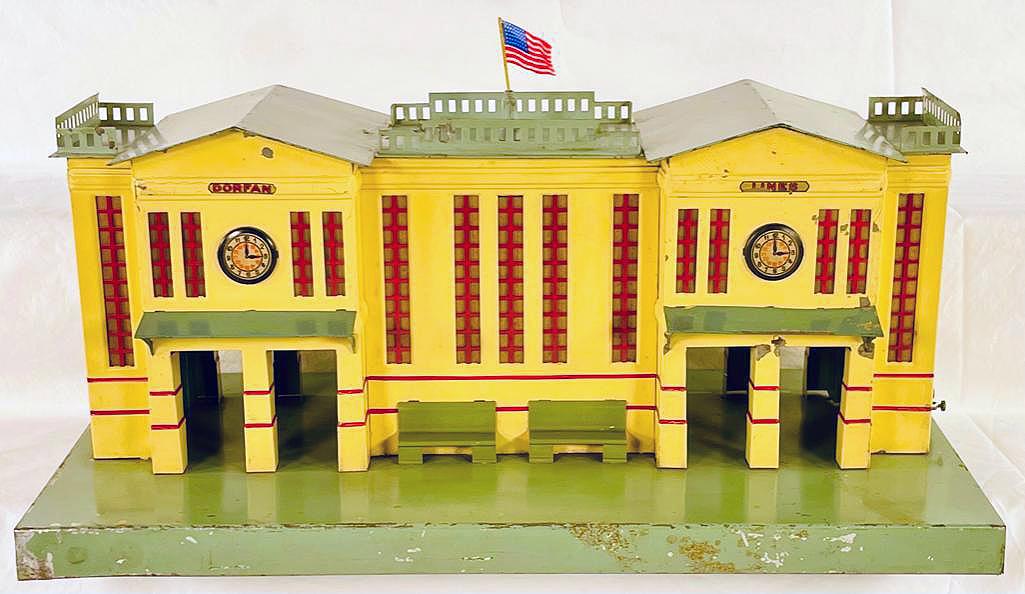 Dorfan Prewar Wide Gauge 427 Station from 1930: Dorfan Prewar Wide Gauge 427 Station from 1930, with the 427 Station being Dorfan's largest station made. It displays two clock faces topped with a flagpole that is probably reproduction flagpole. The