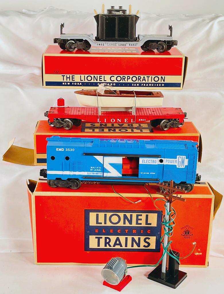 Lionel Postwar 6461 Transformer car, 6801 flatcar with boat and 3530 Operating Generator Car (1 of 2)