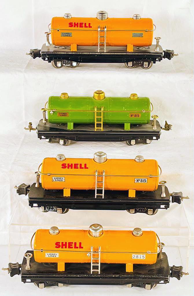 Lionel Prewar O Gauge Orange 815 Tank car, Orange 2815 Tank Car, Orange 2815 Tank Car & 815 Tank Car: Lionel Prewar O Gauge Orange 815 Tank car (may not be original because appears to have been disassembled), Orange 2815 Tank Car, Orange 2815 Tank Car and 815 Green Tank Car, with the 2815/2815/815 Ora