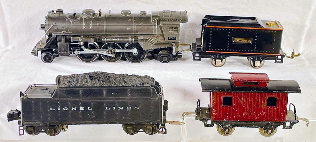 Lionel Prewar O Gauge 224E Gunmetal Loco with 2224TW Black Tender, 257T Black/Orange Stripe Tender: Lionel Prewar O Gauge 224E Gunmetal Loco with 2224TW Black Tender from 1940, 257T Black/Orange Stripe Tender and 801 Maroon/Black Caboose, with the 224E in C6, 2224T in C6 plus [needs cleaning], the 2