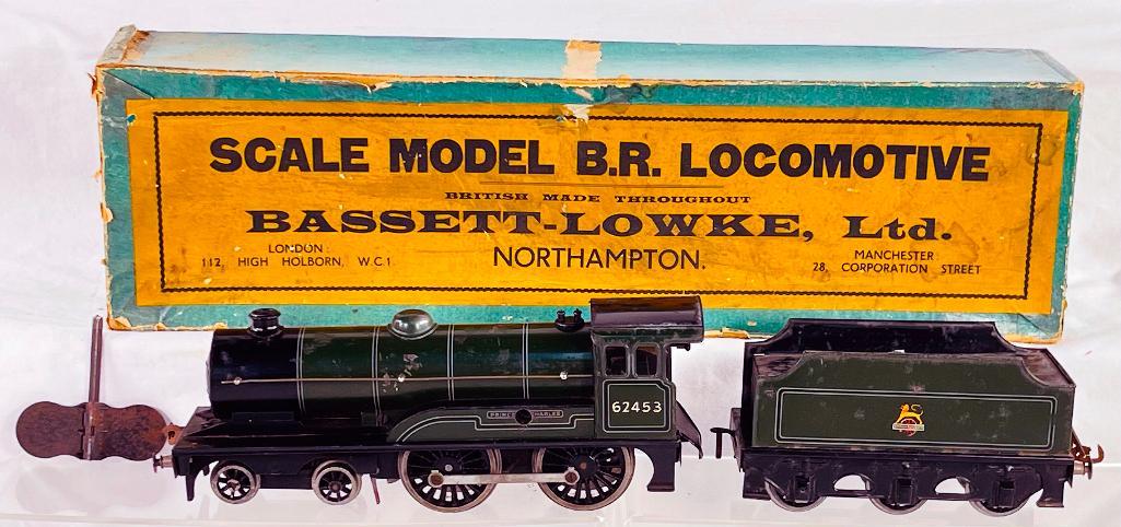 Bassett Lowke Prewar O Gauge Prince Charles Loco and Tender C/W 331/0: Bassett Lowke Prewar O Gauge Prince Charles Loco and Tender C/W 331/0, in C6 overall with key and original instructions and original box that shows heavy wear.