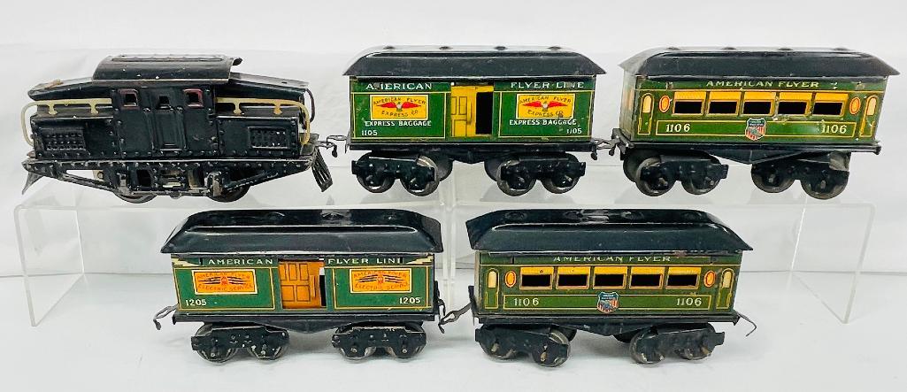 American Flyer Prewar O Gauge 1218 Black Steeple Locomotive with Four Union Pacific Passenger Cars: American Flyer Prewar O Gauge 1218 Black Steeple Locomotive with Four (4) Union Pacific Passenger Cars, with the 1218 electric in C5 minus and missing parts as indicated in the pictures, and the four
