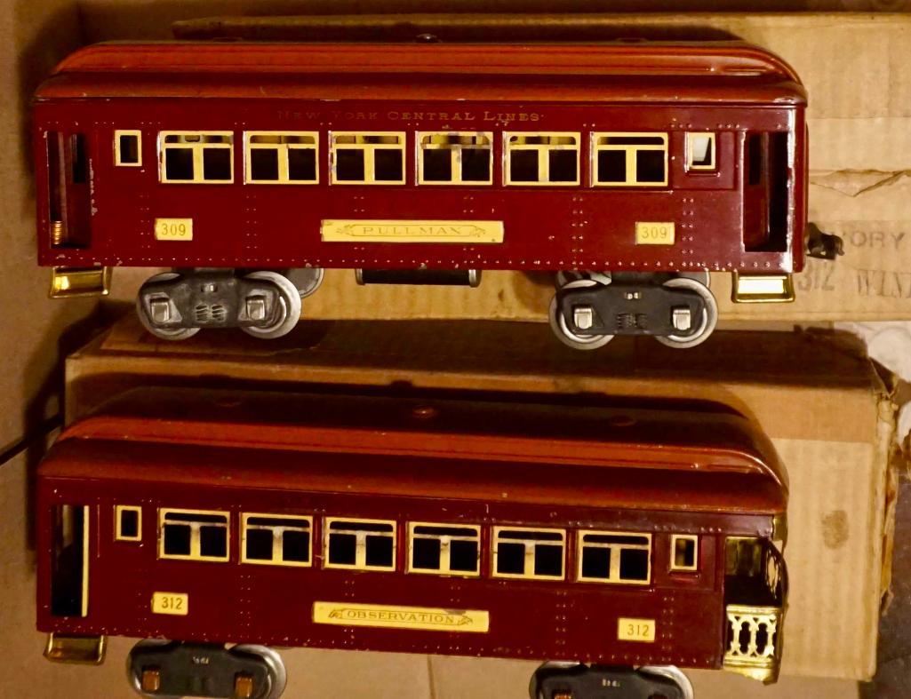 Lionel Prewar Standard Gauge 309 and 312 Wine Ivory Passenger Cars with Boxes: Lionel Prewar Standard Gauge 309 and 312 Wine Ivory Passenger Cars with Boxes, including 309 and 312 Wine Ivory Passenger Cars in C7 to C7 plus overall condition, and includes 2 original boxes that ar