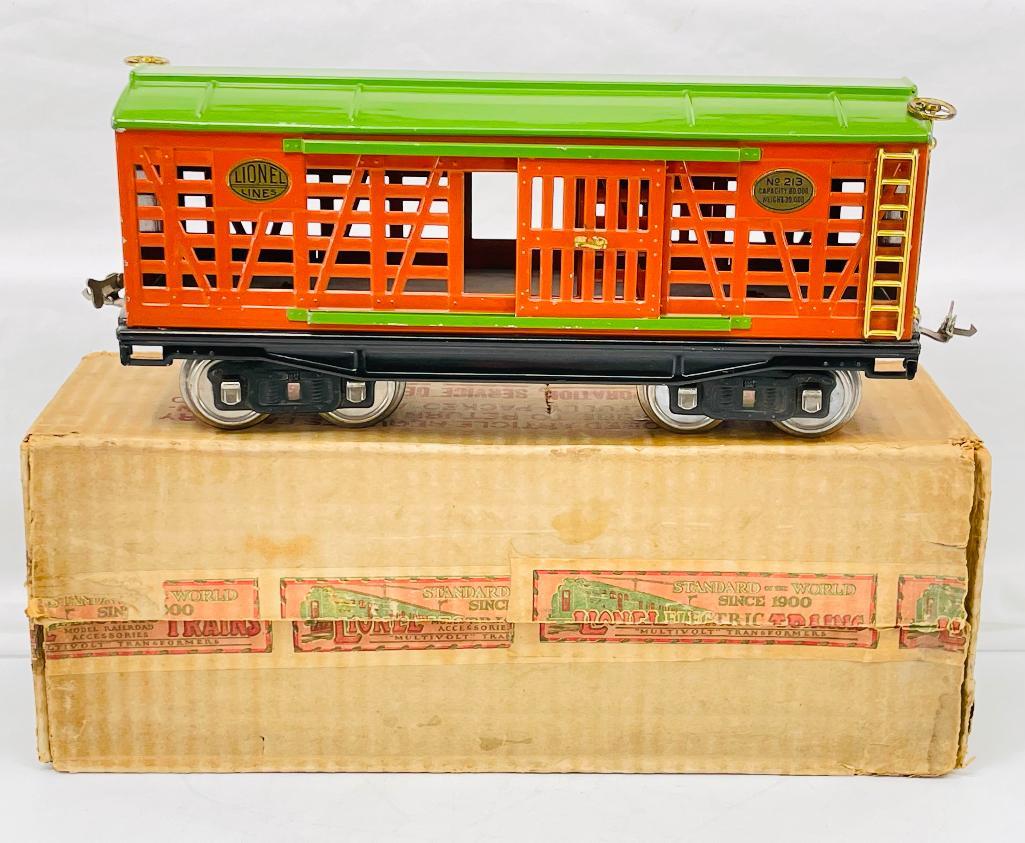 Lionel Prewar Standard Gauge 213 Terra-cotta/Pea Green Roof Livestock Car: Lionel Prewar Standard Gauge 213 Terra-cotta/Pea Green Roof Livestock Car, in C7 or better. Comes with its original box marked 213 cattle that shows light to moderate wear.