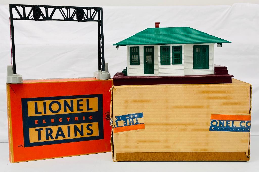 Lionel Postwar O Gauge 132 illuminated Station and 450 Operating Signal Bridge: Lionel Postwar O Gauge 132 illuminated Station and 450 Operating Signal Bridge, both in C7 overall and each in the box.