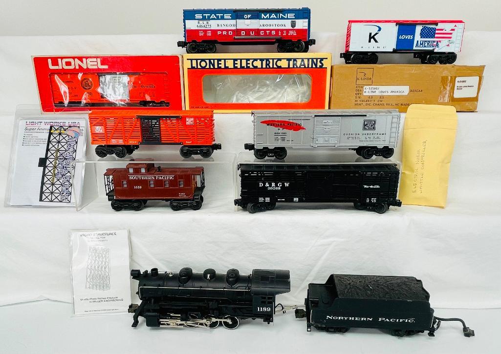 MTH O Gauge 1189 Loco with Tender and Assorted Freight Cars: MTH O Gauge 1189 Loco with Tender and Assorted Freight Cars, including 1189 Loco and Tender in C7, with the five (5) freight cars and one Caboose in C7 overall condition. Also includes odd ball boxes 