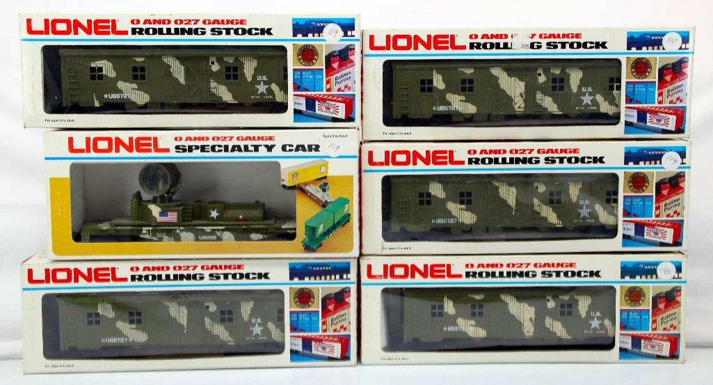 MPC Lionel O Gauge Six (6) Assorted Marine Freight Cars: MPC Lionel O Gauge Six (6) Assorted Marine Freight Cars, including US Marine Bunk Car #6 - 5727 X5 and US Marine Searchlight Car #6- 6526, each in C9/C10 and each in its original box.