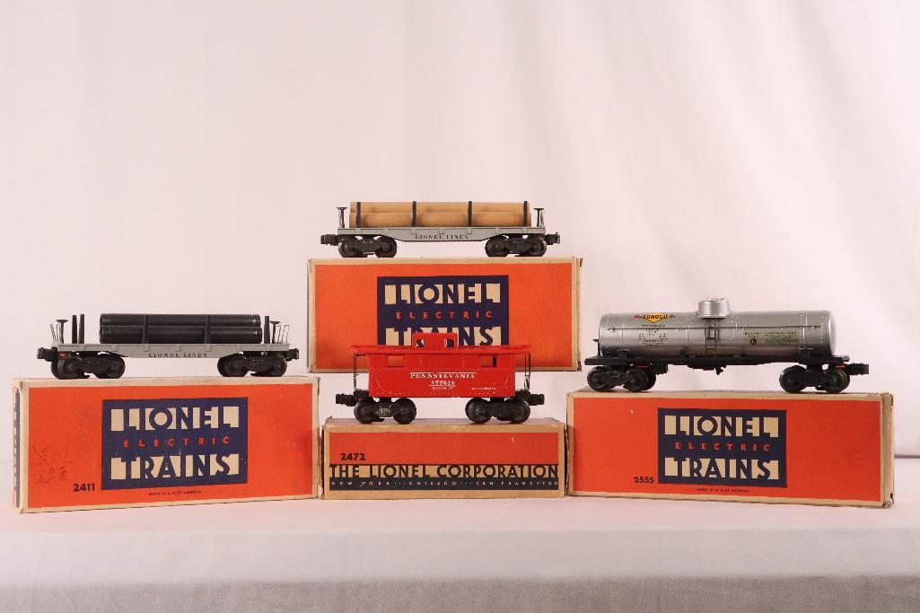 Lionel Postwar 2472 - 2411 - 2555 - 2411: Lionel Postwar 2472 - 2411 - 2555 - 2411, each in C7 or better and each with its original box that show light wear overall.