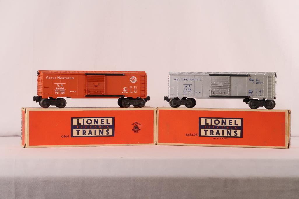 Lionel Postwar 6464 Western Pacific Box Car and 6464 Great Northern Box Car: Lionel Postwar 6464 Western Pacific Box Car and 6464 Great Northern Box Car, with the 6464 Great Northern Box Car in C7 with its original box that has tape repair at one end and the 6464 Western Pacif