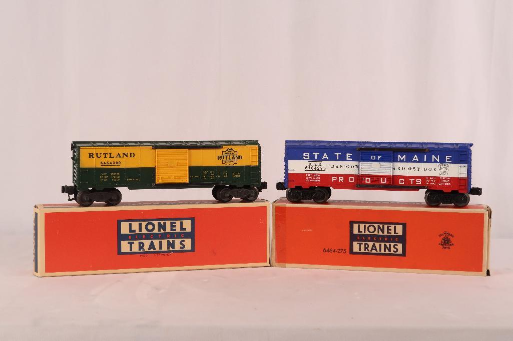 Lionel Postwar 6464 - 275 State of Maine/6464 - 300 Rutland Box Cars: Lionel Postwar 6464 - 275 State of Maine/6464 - 300 Rutland Box Cars, in C7 or better overall condition. Also includes the original box for the 6464 - 275 that has tape repairs at one box end.