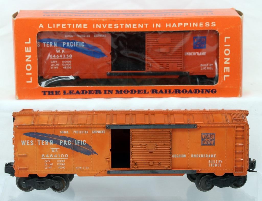 Lionel Postwar 6464 - 250 Western Pacific Box Car X2: Lionel Postwar 6464 - 250 Western Pacific Box Car X2, with one 6464 - 250 Western Pacific Box Car having blue feather in C8 minus and in a Hillside original box with cellophane with tape repai