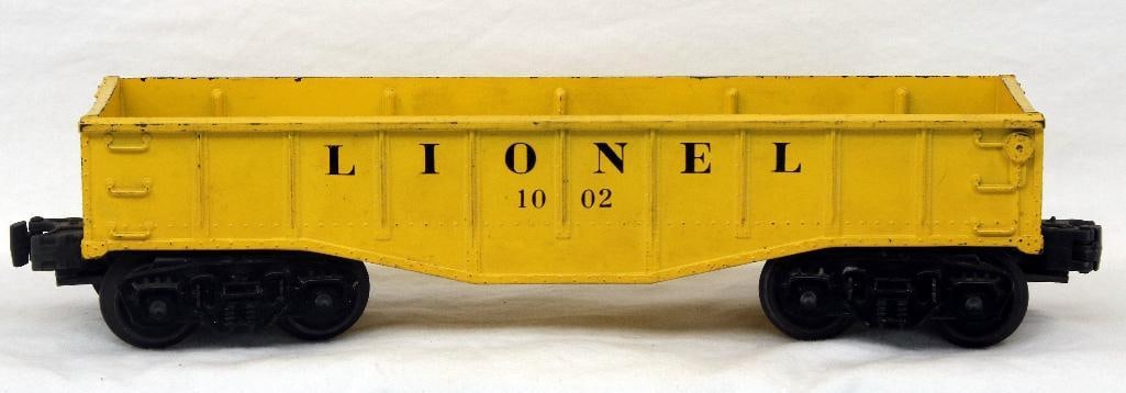 Lionel Postwar 1002 Yellow Gondola: Lionel Postwar 1002 Yellow Gondola, in C7 minus. This is a rare car to find in this condition. Went with the Magnetraction layout.