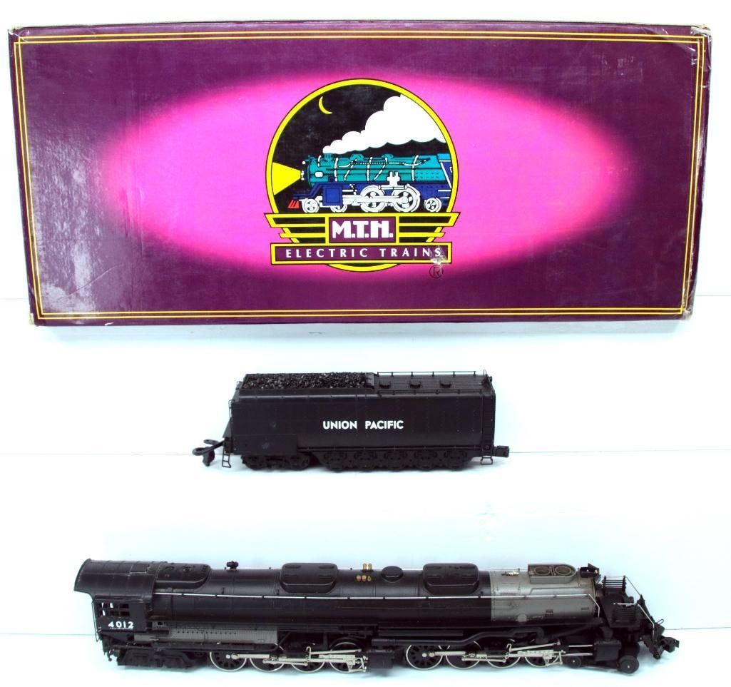 MTH O Gauge Union Pacific Big Boy Diecast Loco and Tender PS - 1 Boxed: MTH O Gauge Union Pacific Big Boy Diecast Loco and Tender # 20-3021-1 PS - 1 Boxed, in C8 plus - test run only - and in its original box that shows light wear.