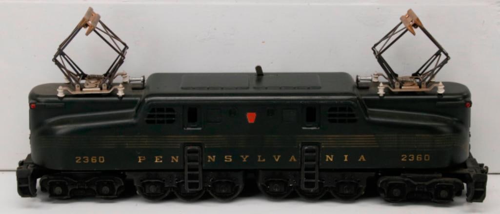 Lionel Postwar O Gauge 2360 Five Stripe Green GG1: Lionel Postwar O Gauge 2360 Five Stripe Green GG1, in C7. The stripes are somewhat faded in the middle as is typical with the GG1s, and the dark green color seems to have faded.