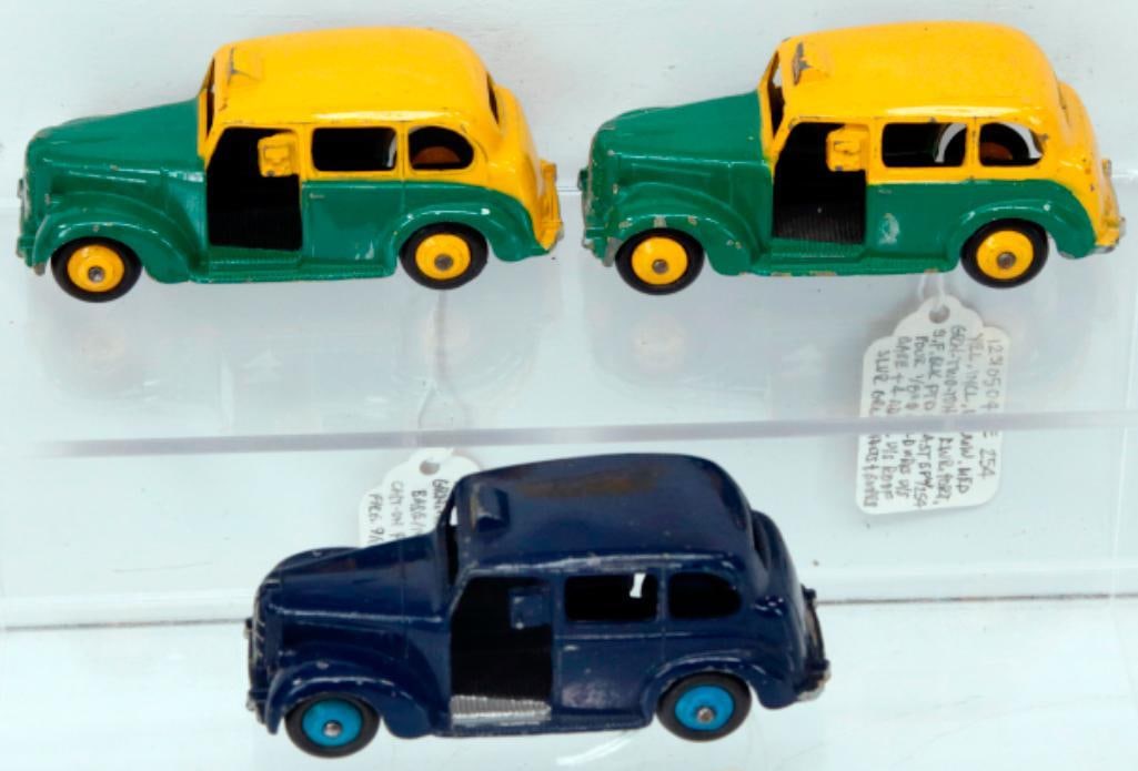 Dinky Toys 254 Austin Taxi from 1954, 40h Austin Taxi from 1951/40h Austin Taxi from 1951: Dinky Toys 254 Austin Taxi from 1954, 40h Austin Taxi from 1951/40h Austin Taxi from 1951, with the dark blue 40h in C7, the yellow green 40h in C7 plus and the 254 in C7 minus to C7.
