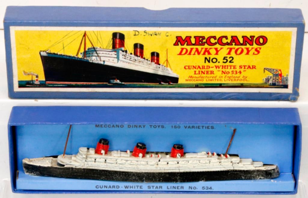 Dinky Toys No. 52 Cunard-Whitestar Liner: Dinky Toys No. 52 Cunard-Whitestar Liner, in C5 minus because diecast is deteriorating but otherwise exceptionally clean, with its original box that shows faint wear but some handwriting on the top.