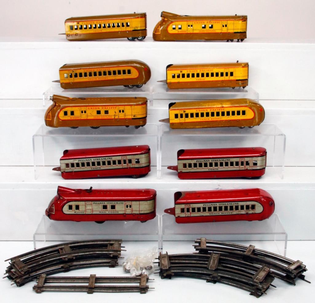 Marx Toy Trains O Gauge M - 10000 Red/Silver Streamliner and UP M-10000 Yellow/Brown Streamliner: Marx Toy Trains O Gauge M - 10000 Red/Silver StreamlinerÂ that is British Marx and Union Pacific M - 10000 Yellow/Brown Marx Streamliner, with the red and gray 4 Car Streamliner Set in C6 mi