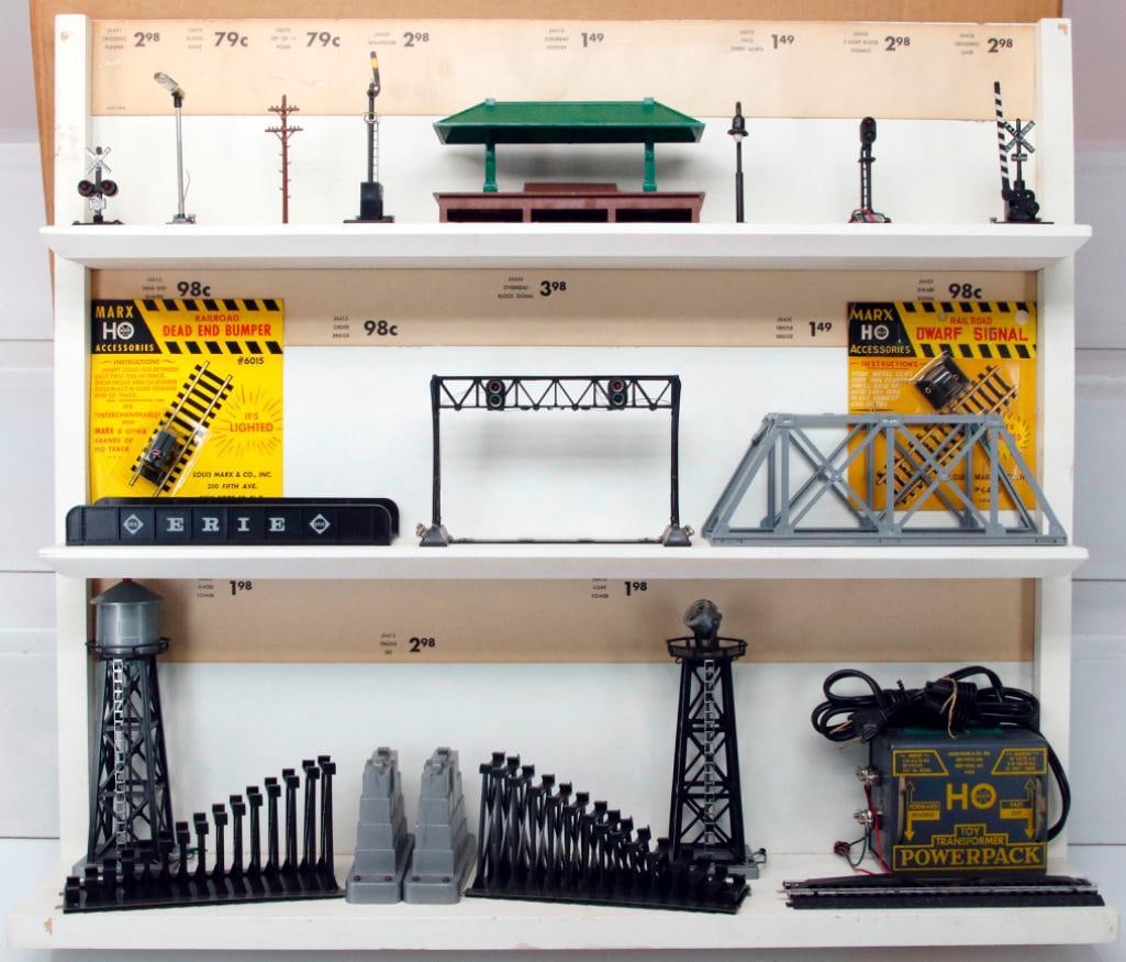 Marx Toy Trains HO Gauge Store Display for Accessories Boxed: Marx Toy Trains HO Gauge Store Display for Accessories Boxed, in C8 and with its original wood store display stand and in its original box, in C8 minus. This is from the Marx Factory archives.