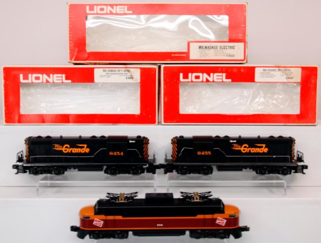 Lionel Modern O Gauge Rio Grande GP-7 Diesel Powered and Rio Grande GP-7 Diesel Nonpowered: Lionel Modern O Gauge Rio Grande GP-7 Diesel Powered and Rio Grande GP-7 Diesel Nonpowered and Milwaukee Road Electric, each in C8 and each in its original box. All the boxes show light wear.