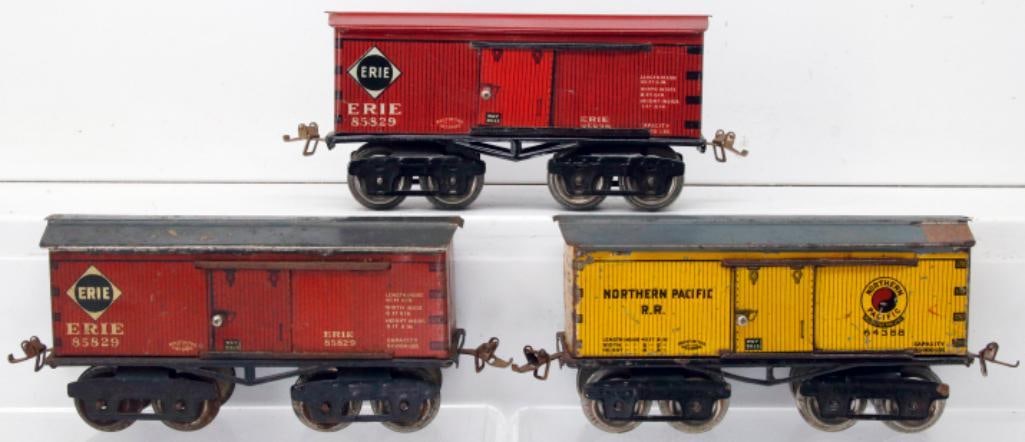 Ives Prewar O Gauge 64388 Northern Pacific/85829 Erie/85839 Erie six-inch Box Cars: Ives Prewar O Gauge 64388 Northern Pacific/85829 Erie/85839 Erie six-inch Box Cars, with the Northern Pacific in C5 plus to C6 minus because of missing paint on roof, the Erie with gray roof in C6 min