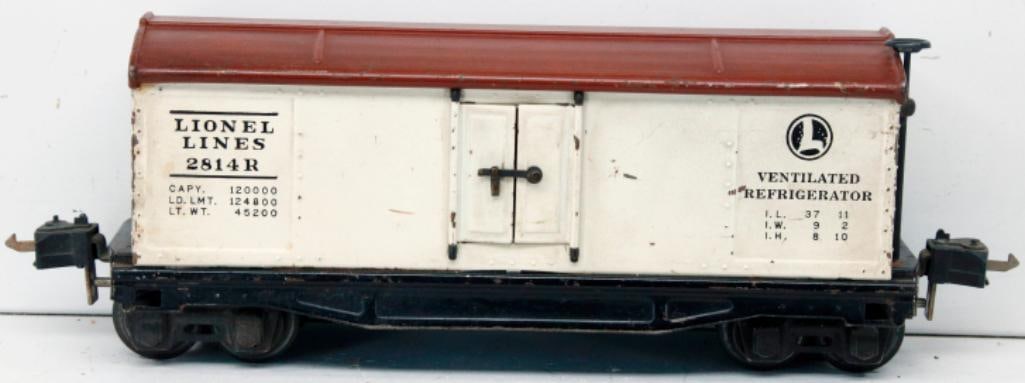Lionel Prewar O Gauge 2814R Rubberstamp Refrigerator Car: Lionel Prewar O Gauge 2814R Rubberstamp Refrigerator Car, in C6 and missing one brake wheel at one end.