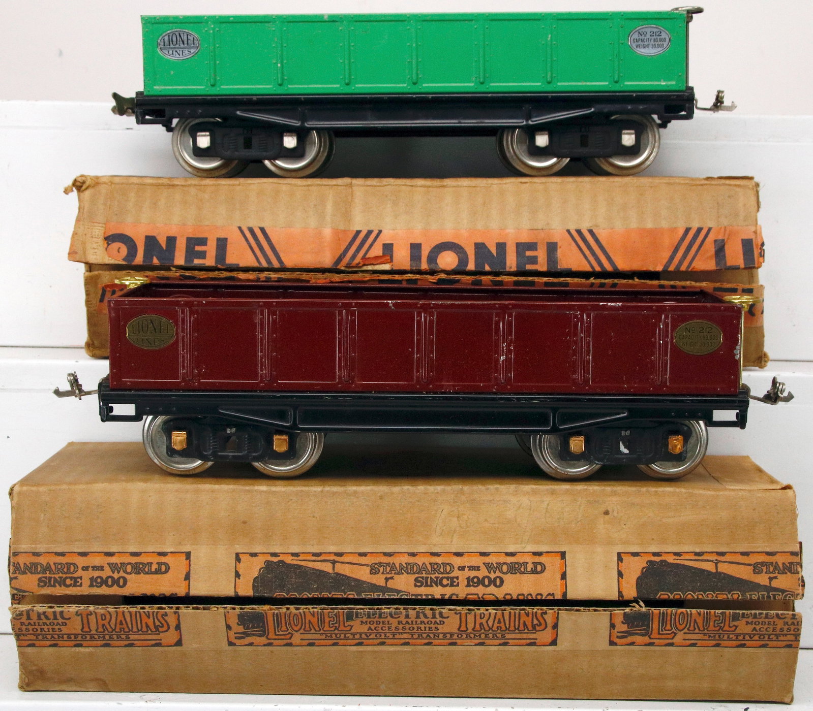 Lionel Prewar Standard Gauge 212 Wine Gondola and 212 all nickel Green Gondola Boxed: Lionel Prewar Standard Gauge 212 Wine Gondola and 212 all nickel Green Gondola Boxed, with the 212 Wine Gondola in C6 plus and with its original box that shows light wear and the 212 all nickel green 