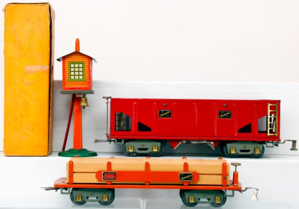 American Flyer Prewar Wide Gauge 4006 red Hopper and 4023 Orange Lumber Car: American Flyer Prewar Wide Gauge 4006 red Hopper and 4023 Orange Lumber Car, with the 4006 in C6 and the 4023 in C7. Also comes with the 92 Watchmen's Tower, in C7 and with its original box that s